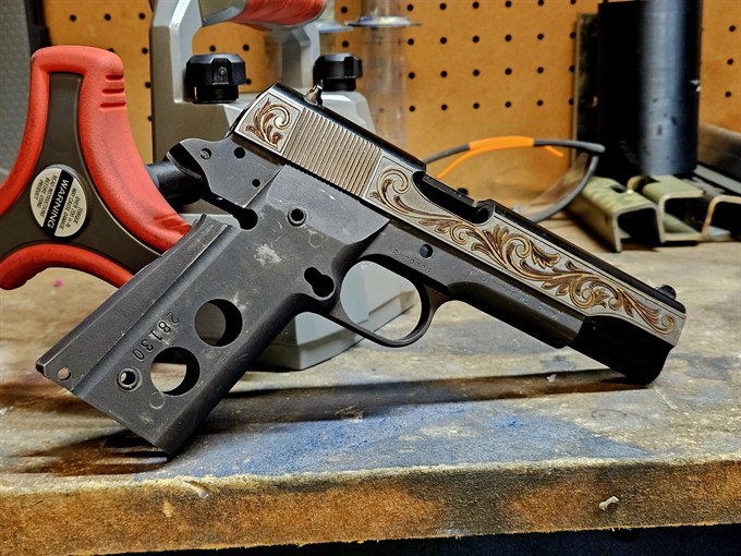 1911 with full scroll engraving across the slide and frame